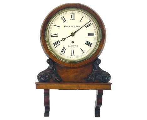 A late Victorian walnut cased bracket type wall timepiece. The white dial signed Banner &amp; Son, Lewes, fitted a single fus