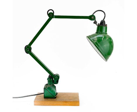 An industrial adjustable lamp. With a green enamel shade, approximate length 82cm.