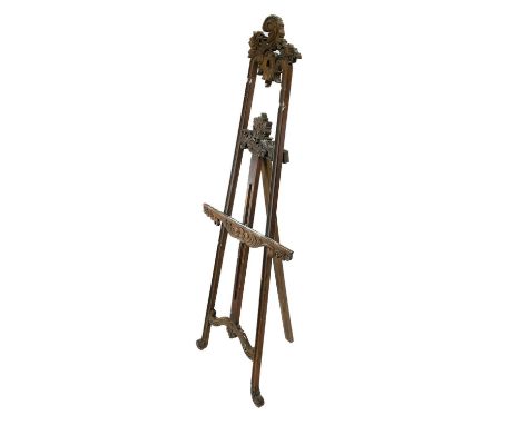 A carved hardwood artist's easel. 20th century, from the studio/estate of Allahn McRae, Penzance, height 217cm, width 80.5cm.