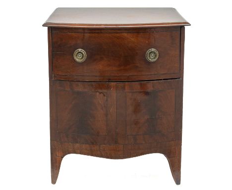 A George III mahogany bow front commode. With rising front and ceramic liner, height 69cm, width 61cm, depth 40cm.