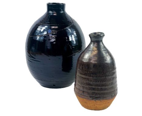 A studio pottery tenmoku glaze lamp base. Impressed marks, height 23cm, together with another larger studio pottery lamp base