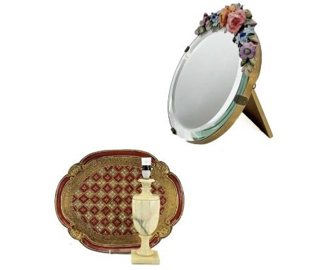 A circular Barbola style easel mirror. With a floral moulded crest, diameter 17.5cm, together with a Florentine lacquered tra