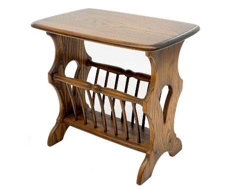Ercol magazine rack. Height 51cm width 55cm depth 36.5cm.