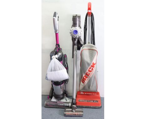 A Dyson “V6” cordless stick vacuum cleaner; a Vax upright vacuum cleaner; a Hoover “Aquamaster” wet &amp; dry vacuum cleaner;