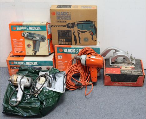 Seven various power-tools, six boxed.