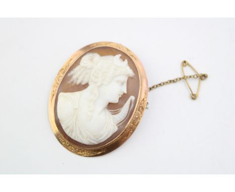 Antique 9ct gold mounted cameo brooch depicting a bust portrait of a lady, metal pin and safety chain, 49mm tall, gross 10.0g