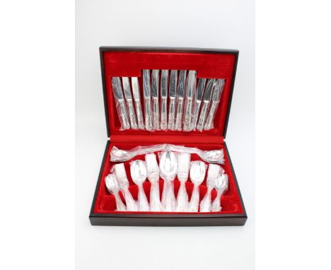 A vintage boxed canteen of silver plated cutlery with Sheffield stainless steel blades.  In new old stock condition.