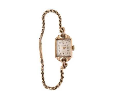 A lady's vintage 9ct gold cased Rotary wristwatch with 9ct gold bracelet strap, the signed rectangular dial with Arabic numer