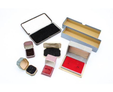 A collection of vintage and antique paper wrapped jewellery boxes to include ring boxes, watch box and other similar examples