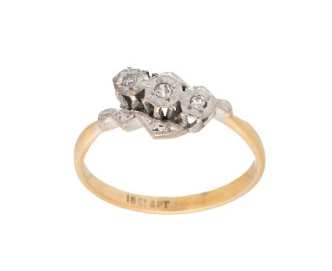 An 18ct gold, platinum and diamond vintage three stone ring, illusion set, size O/P, 2.9g.