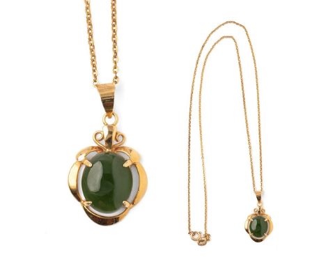 A jade / nephrite pendant in 15ct yellow gold mount on a 9ct yellow gold chain. (Length 47.5cm). Weight 2.6g.