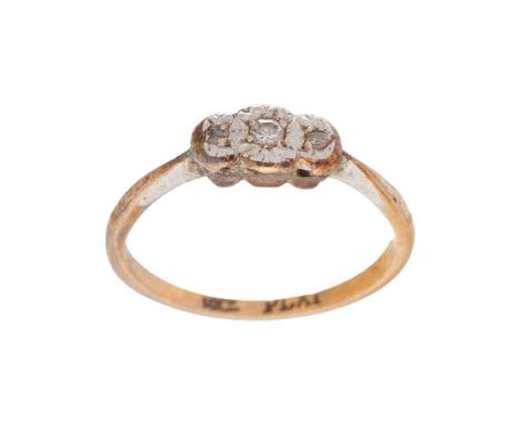 An 18ct gold, platinum and diamond vintage three stone ring, illusion set, size L/M, 1.8g.