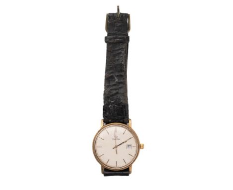 A vintage Omega gentleman's wristwatch the signed champagne dial with baton numerals, minute track and date aperture at 3 o'c
