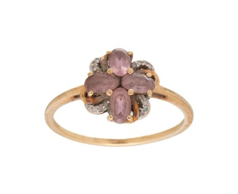 A vintage 9ct gold, rose quartz or amethyst and diamond set flowerhead ring, of four petalled form with diamond chip highligh