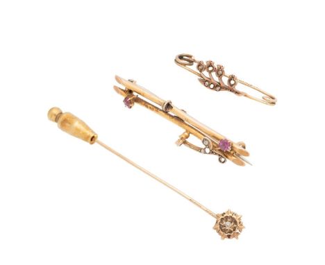 Two 9ct gold sweetheart brooches, one a floral example set with seed pearls, the other set with rubies and seed pearls but sl