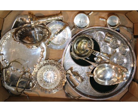 A collection of silver plated items to include, candle stick, drinks tray, wine coasters, bon-bon dishes and other similar it