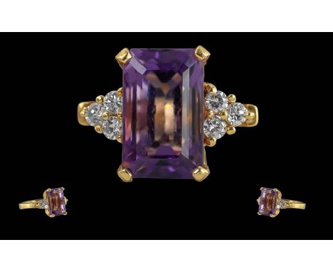 Ladies 14ct Gold Pleasing Quality Amethyst and Diamond Set Dress Ring. Marked 585 - 14 ct to Shank. The Step-cut Amethysts of