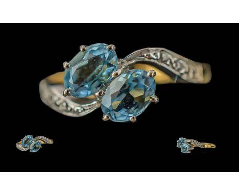 Ladies 18ct Gold Aquamarine and Diamond Set Two Stone Ring, Full Hallmark to Interior of Shank. The Two Aquamarines of Good C