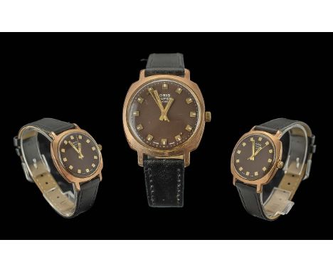 Gentleman's Vintage Manual Wind Oris Super, gold plated, 17 jewels, in working order at time of cataloguing. Black face with 