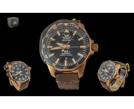 Vostok - Europe NI Rocket 24 Jewels Automatic Gents Gold on Steel Wrist Watch. Features Black Dial, Watch Case 40 mm, Luminou