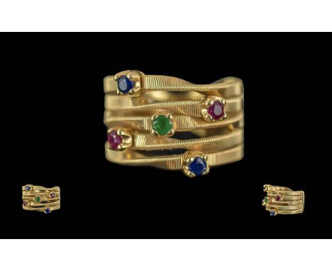 Marco Bicego Signed 18 carat gold Gem Set Fashion Ring marked 750. Set with emeralds, rubies and sapphires of pleasing colour