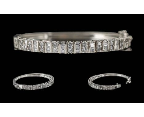 Ladies Good Quality 14ct White Gold Baguette and Brilliant Cut Diamond Set Hinged Bangle. Marked 14ct, Push Button Clasp, Dia