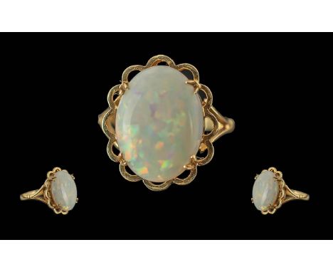 Ladies 9ct Gold - Large Single Stone Opal Set Ring, Marked 9ct Gold to Shank, The Large Oval Shaped Opal of Pleasing Colour, 