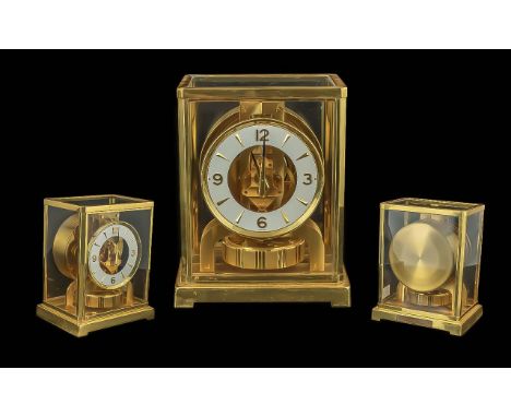 Jaeger-Lecoultre Atmos Classic Clock, with paperwork from Garrards dated April 1976.  Gilt brass and glass cased.