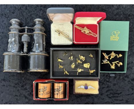 Small Box of Collectibles, including a pair of binoculars, a pair of napkin rings, an RAF wing badge, a Stratton tie clip in 