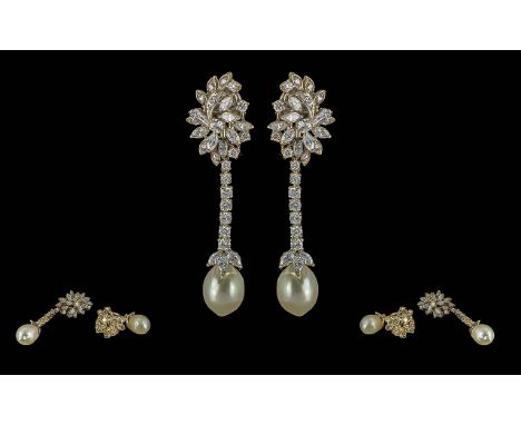 Ladies Fine Quality 14ct White Gold Diamond and Pearl Set Drop Earrings. Set with Marquise - Step-cut and Round Brilliant Cut