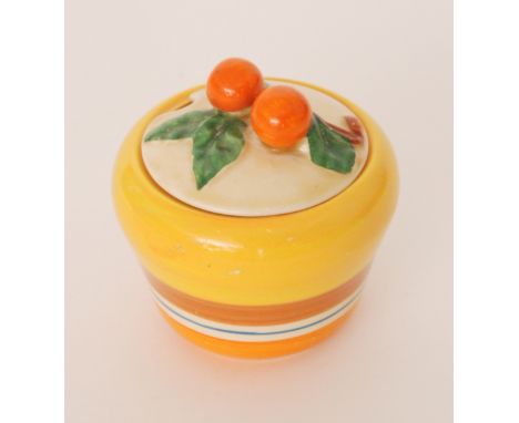 A Clarice Cliff shape 230 preserve pot and cover with yellow, brown and orange banding with a blue pin stripe, printed Newpor