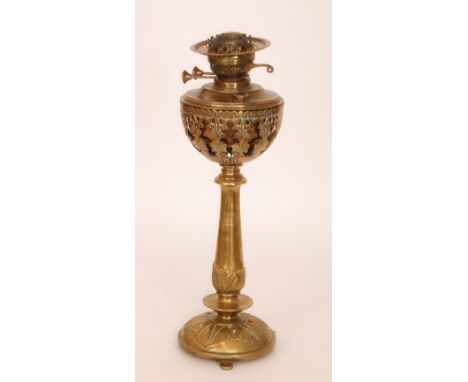 A late Victorian brass oil lamp with reservoir, no shade, height 50cm