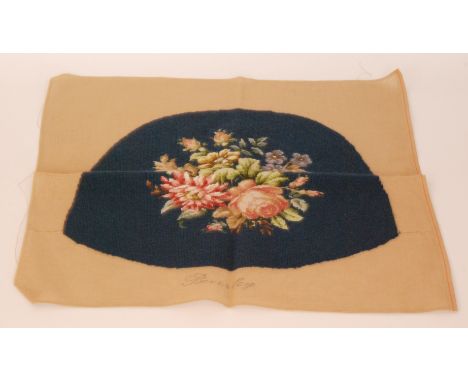 A set of eight embroidered seat cushion covers each with a needlework tapestry spray of flowers against a blue ground, pad si