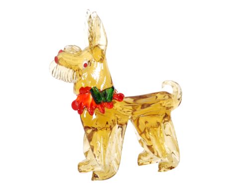 A large post war Italian Murano glass figure of a stylised dog in golden amber with applied red features including a frill co