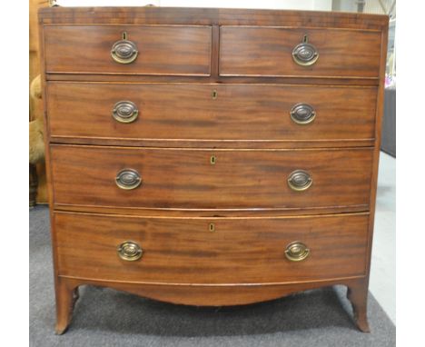 A George III crossbanded mahogany bow front chest of two short and three long drawers, width 104cm