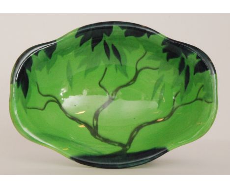 A Carlton Ware Handcraft Green Trees pattern 3569 quatrefoil bowl decorated with a stylised tree against a green ground, prin