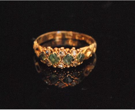 A mid 19th Century 9ct hallmarked green stone and diamond ten stone ring, four green stones spaced by six rose cut diamonds t