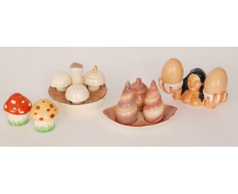 Three assorted Carlton Ware cruet sets comprising a mushroom and shell shaped three piece set and a lady holding out two eggs