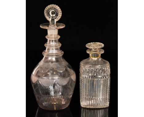 A late 18th Century Irish type Prussian form cut crystal glass decanter with basal moulding, cut swags and three annulated ri