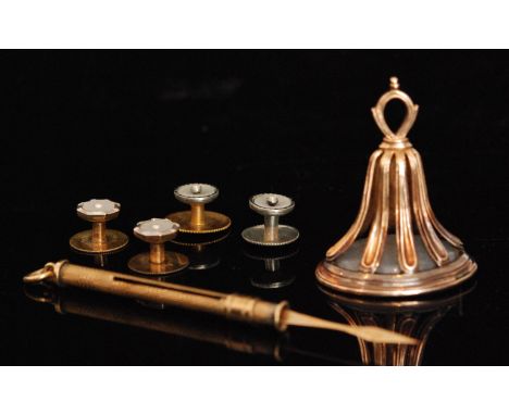 A 9ct retractable toothpick with engine turned decoration, together with a yellow metal stone set seal and four mother of pea