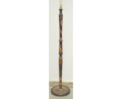 A 20th Century Chinese style red lacquered baluster standard lamp and shade decorated all over with flowers on a domed base, 