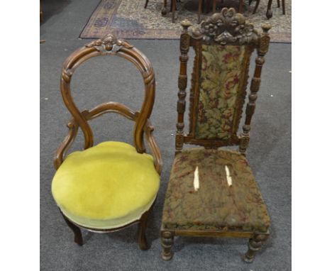 A Victorian carved walnut hoop back salon chair on cabriole legs upholstered in pale green plush and a Victorian tapestry car
