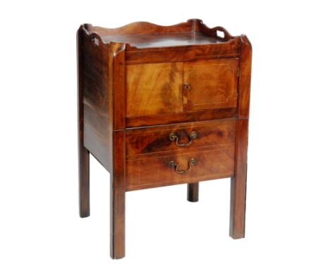 A George III mahogany tray top bedside commode, the pull out drawer containing an associated white ceramic pail and cover, wi