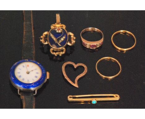 A small parcel lot of jewellery to include two wedding bands, one 22ct, the other unmarked, a rose gold garnet and seed pearl