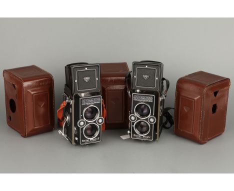 Two Rollei Magic TLR Cameras, including Magic II and Magic, both in make's cases, together with one additional case (3)