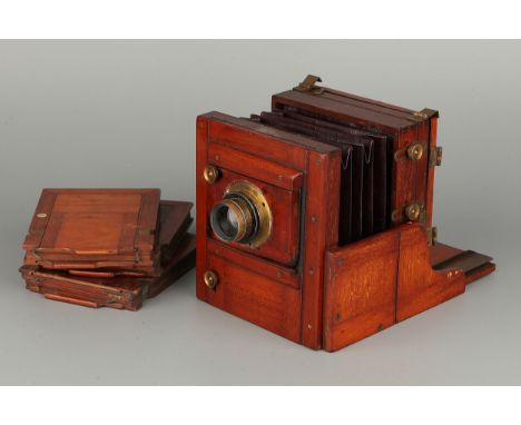 An Unmarked Quarter Plate Mahogany Tailboard Camera, with Aldis No.2a f/8 brass lens, with three DDS