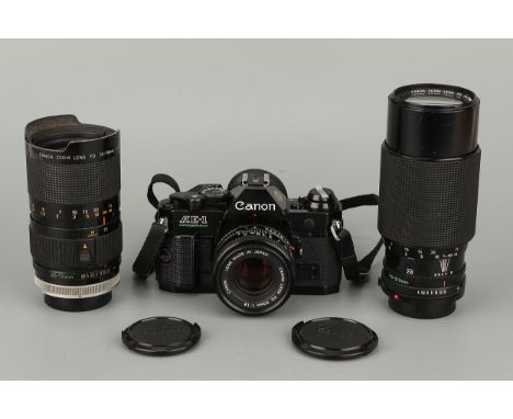 A Canon AE-1 Program SLR Camera, with FD f/1.8 50mm lens, together with FD S.S.C. f/2.8-3.5 35-70mm and FD f/4 70-210mm lense