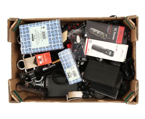 A Selection of Various Camera Accessories, including two Digital Timer Remotes, Nikon SD-8A, Nikon MC-20, extension tubes, le