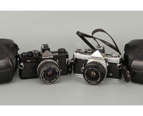 Two Olympus OM-2n SLR Cameras, one black paint, with G.Zuiko Auto-W f/3.5 28mm lens, chrome nose, one chrome, with G.Zuiko Au