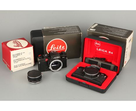 Two Leica R4 SLR Bodies, together with a Leitz Extender-R 2x lens, all boxed (3)